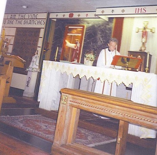 Father Kierce saying mass; date unknown but likely 1980s.