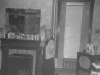 034-nana-by-fireplace-in-front-room-1961